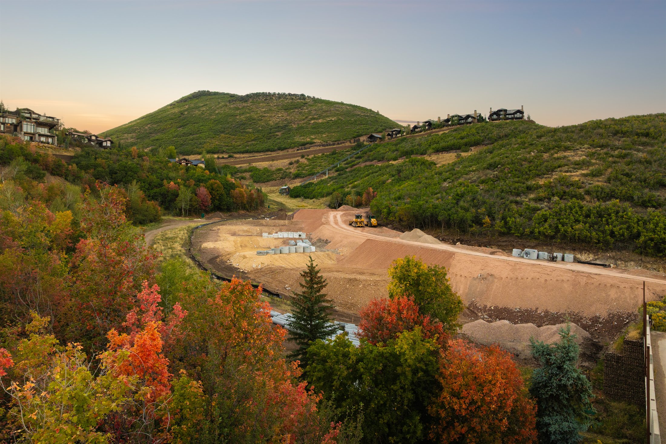 West end of the site framed by red and orange fall foliage